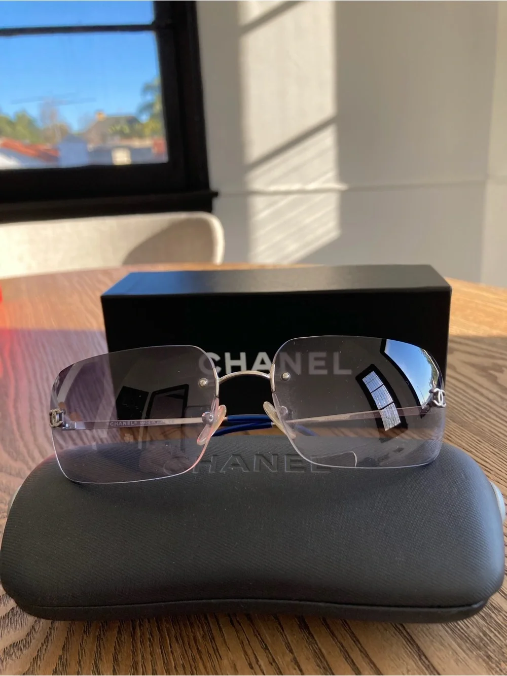 CHANEL Rimless Sunglasses with Blue Gradient Lenses